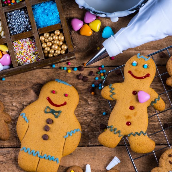 Happy gingerbread man on table, Christmas decoration